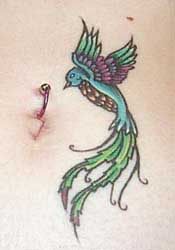 Sennie's bird tattoo and navel peircing